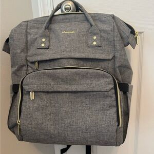 Lovesak Gray Backpack with Gold Accents.  Laptop compartment.